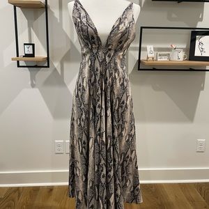 Jennifer Lopez snakeskin leather dress